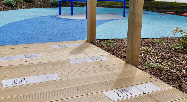 Marlborough Park - An interactive sound bridge leading to the carousel.