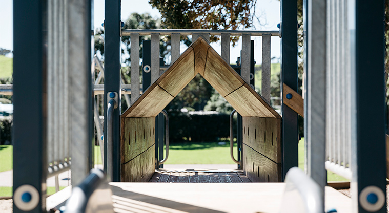 Martins Bay Holiday Park - Looking through the tunnel on the playground.
