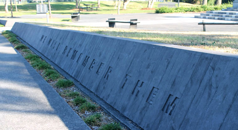 May Road War Memorial Park – Memorial wall along a section of path.