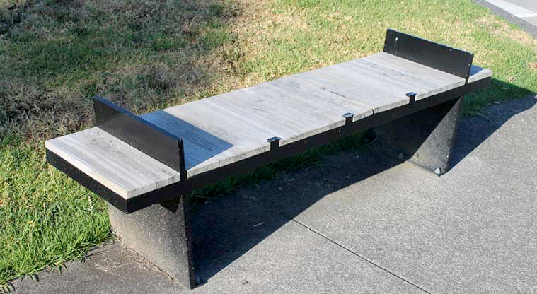 May Road War Memorial Park – Accessible seating on the edge of the footpath.