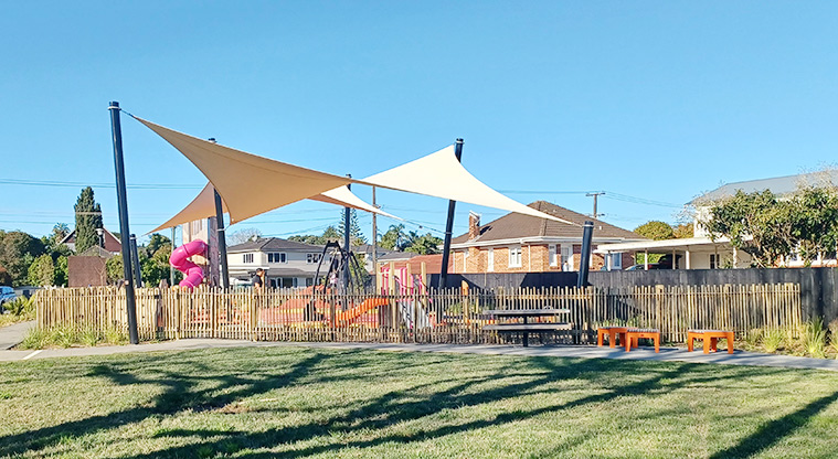 Michaels Avenue Reserve - View of the fenced playground from the reserve.