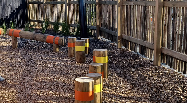 Michaels Avenue Reserve - Colourful stumps and balance beam.