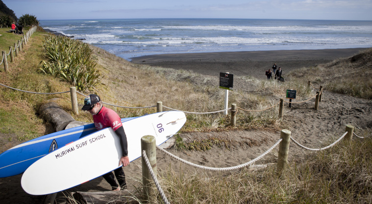 Muriwai Regional Park - Surfing students coming back from training.