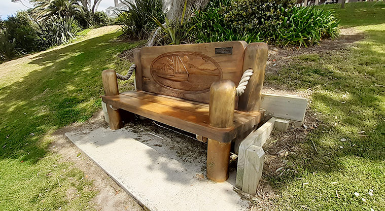 Murrays Bay Beach Reserve - Carved bench seat looking out towards Rangitoto Island.