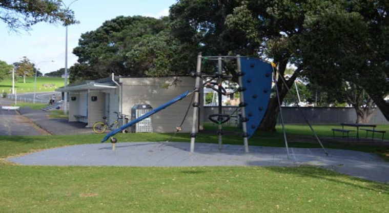 Narrow Neck Beach - Climbing equipment with the toilets and trees in the background.