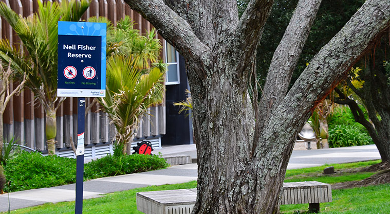 Nell Fisher Reserve - Reserve sign with the Birkenhead Library and bouncy ladybird in the background. Photo credit: Aleksandar Ćirilović.