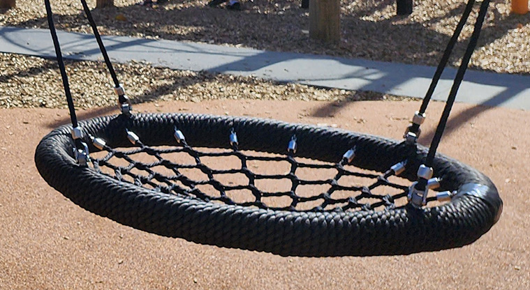 Ngāti Ōtara Park - Closeup of the basket swing.