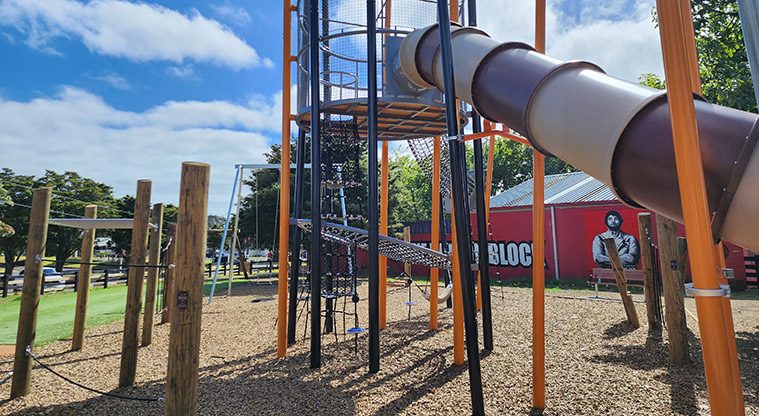 Ngāti Ōtara Park - Part of the climbing tower with a long covered slide, nets and ropes.
