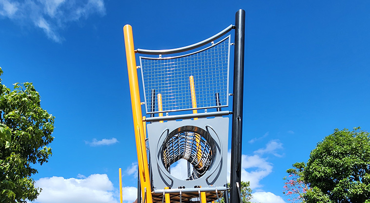 Ngāti Ōtara Park - The top section of the high climbing tower showing a safety guard and a rope tunnel.