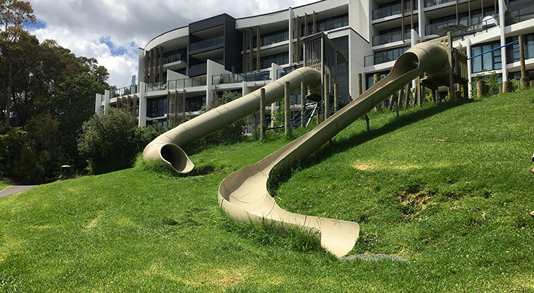 Nixon Park - Two long slides (one covered and one open) running down the hill. Photo credit: S Hulse