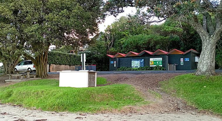 Oneroa Beach Reserve - An electric barbecue on the beach side of the road and the toilet block in the background. Photo credit: K Sumner.