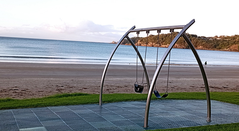 Oneroa Beach Reserve - Swing set with a view over Oneroa Bay. Photo credit: K Sumner.