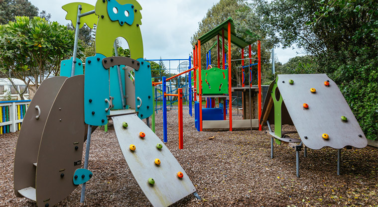 Ōrewa Beach Holiday Park playground junior climbing walls. 