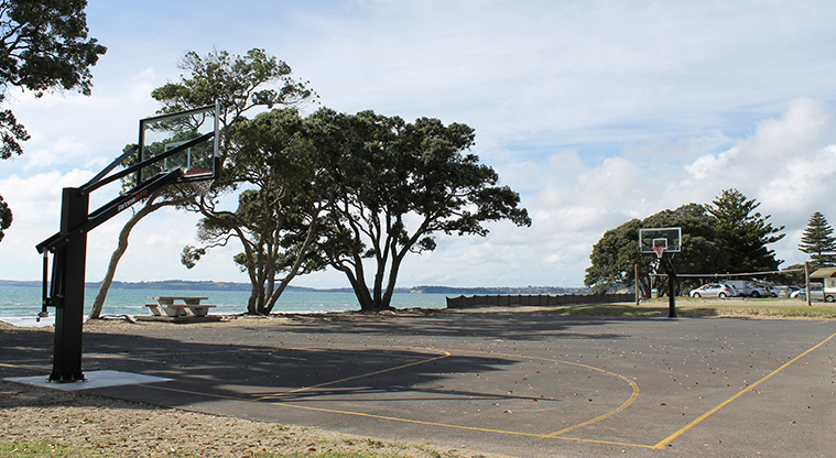 Ōrewa Domain - Basketball court and hoops with the beach in the background. Photo credit: M Loubser.
