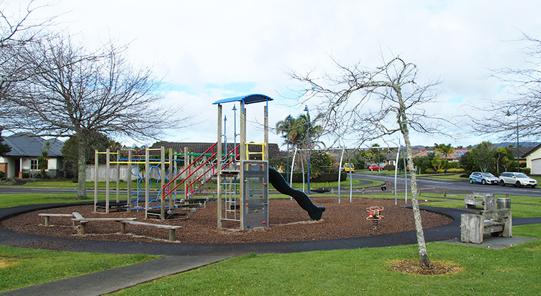 Paremuka Lakeside - Playground with climbing equipment, wobbly bridge, slide, swings and rocker toy and seats. Photo credit: Tracey Hodder.