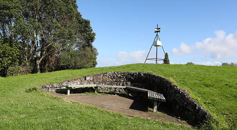 Point View Reserve - Trig station and bench seat at the top of a hill.