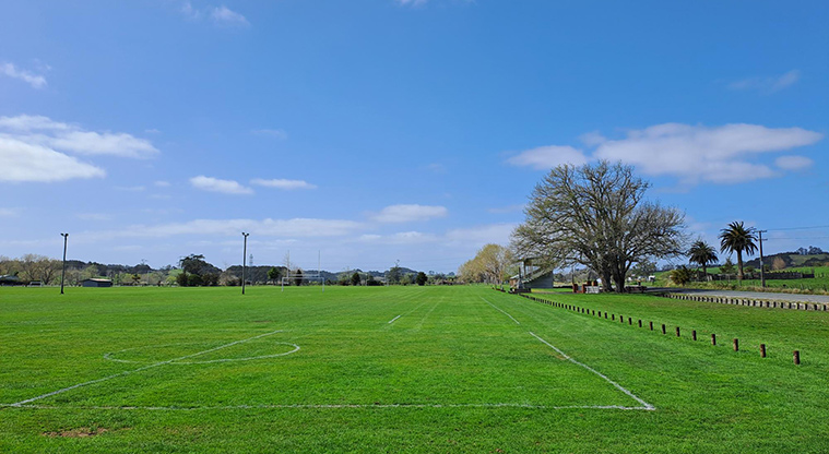 Port Albert Recreation Reserve - Sports fields with the grandstand and parking area on the right.