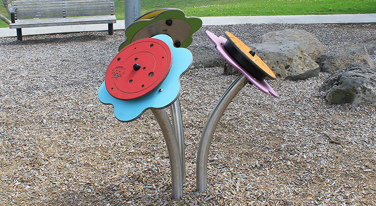 Red Beach Park - Spinning flowers toy. Photo credit: M Loubser.