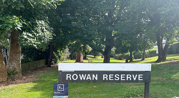 Rowan Reserve - Reserve sign with grassed space and trees in the background. Photo credit: S Hulse