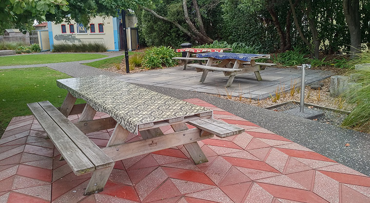 Sandringham Reserve - Two picnic tables with patterns covers. Photo credit: J Grigg.