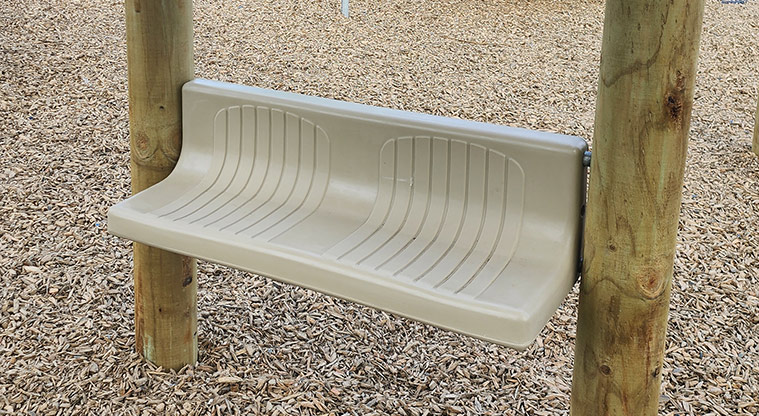 Santa Cruz Park - Small bench seat under the high play module.