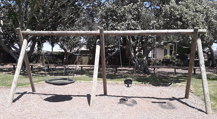 Seaside Park - Set of three swings, including an accessible basket swing.