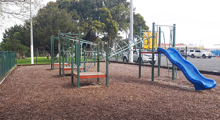 Stadium Reserve - Playground with various platforms, climbing and swinging equipment and a slide.