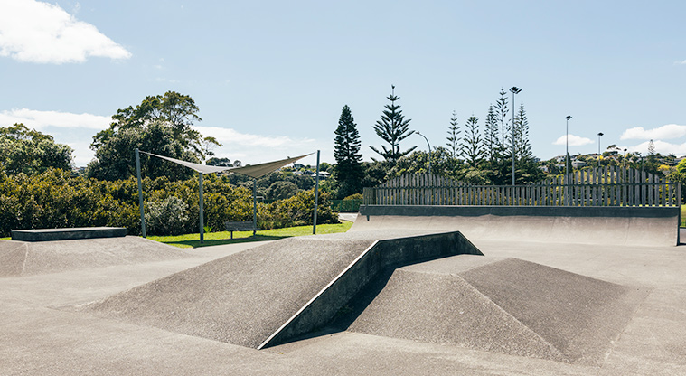 Stanmore Bay Park - Section of the skate park with ramps, ledges and the half-pipe with the shade sail and seat in the background. Photo credit: J Farnworth.