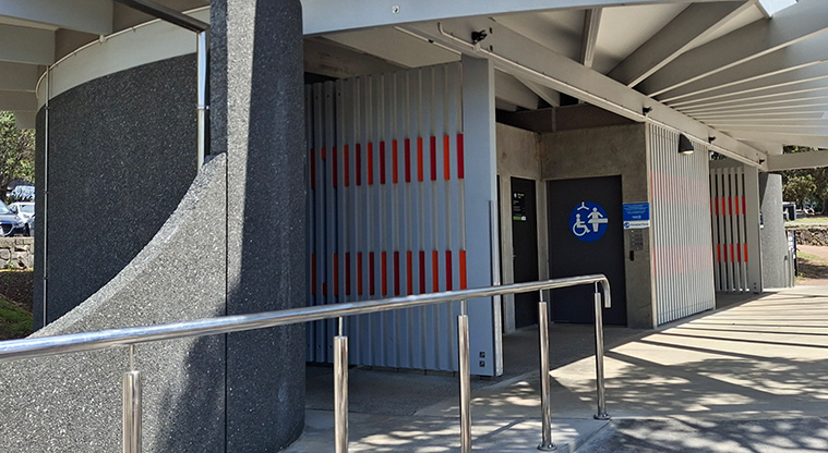 Takapuna Beach Reserve - Accessible toilets and bathroom - the door with the wheelchair, shower and table icons shows where to access the Changing Places bathroom.