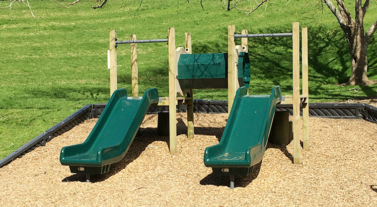 Taumata Reserve - Two green slides with a covered tunnel between them. Photo credit: S Hulse.