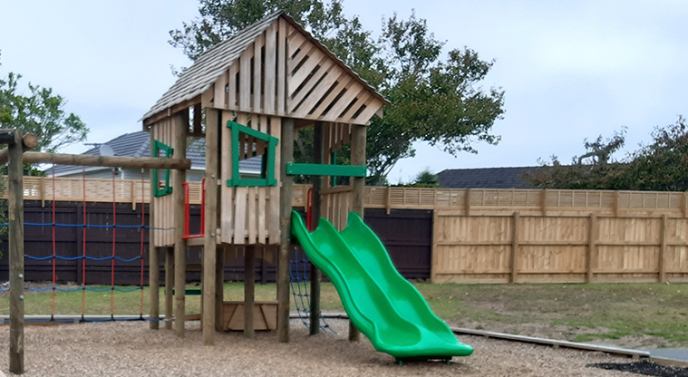 Te Atatu Peninsula Park - Cubby house with climbing nets and a double slide. Photo credit: Tracey Hodder.