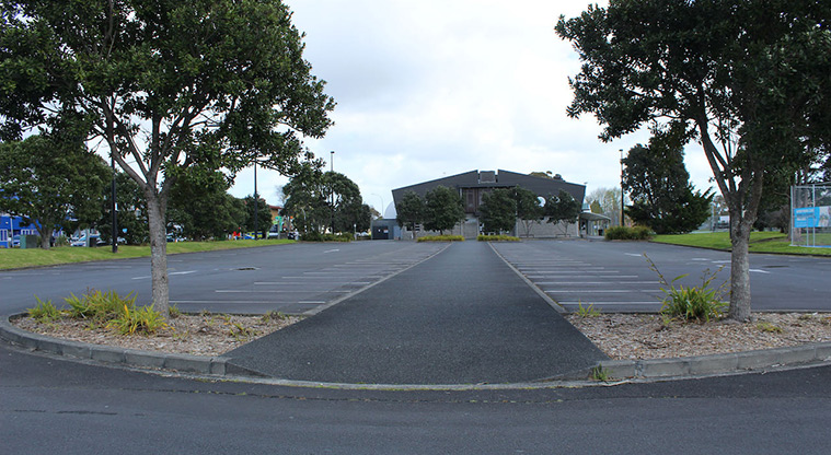 Te Pai Park - Large car park with a path down the middle.