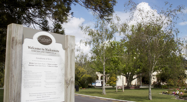 Waikumete Cemetery – Main entrance to the cemetery with the Chapel One, and Chapel Two and the office under the trees in the background.