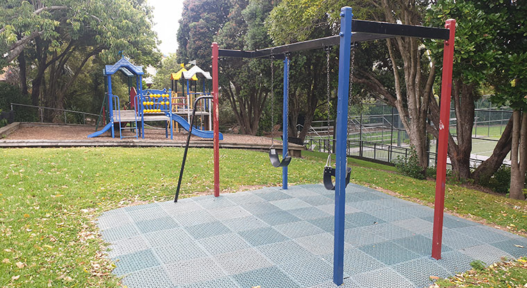 Warren Freer Park – Set of swings, and playground with climbing equipment, bridge and slide. Photo credit: J Grigg.