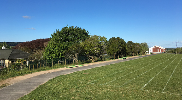 Huapai School Path - Asphalt path around the playing field.
