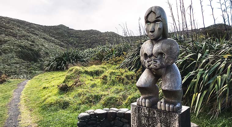 Mercer Bay Loop Track - A pou whenua (marker sculpture) indicates that this site is significant to Te Kawerau a Maki.