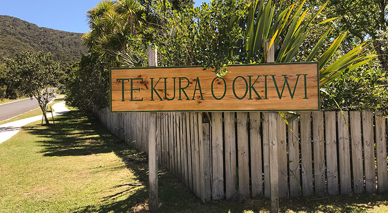 Okiwi Park Path - Sign at the corner of the Okiwi Primary School.