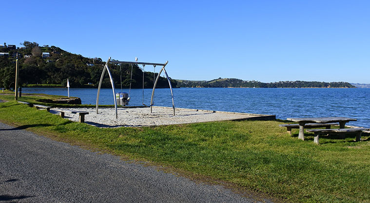 Three Beaches Path - Halfway along the beach are some simple swings with great views. The path continues on to Kiwi Street.