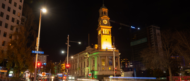 Town Hall lit up in colours at night.