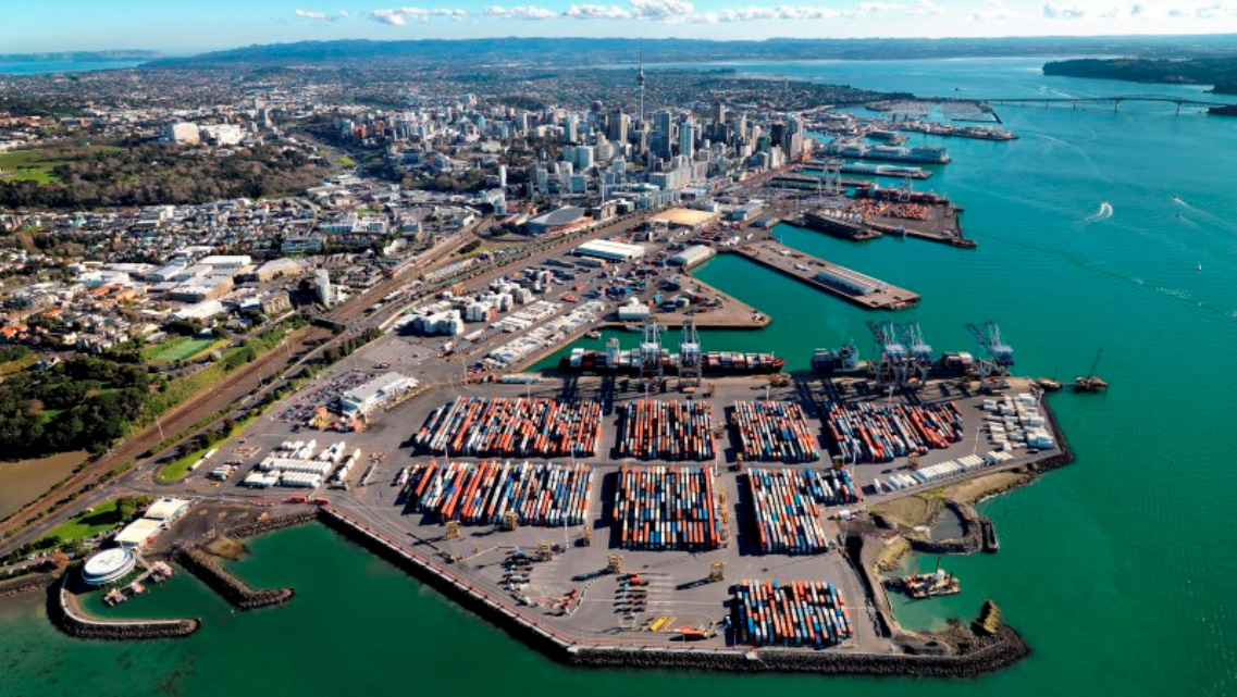 A high-angle view of Port of Auckland with Auckland city in the background.