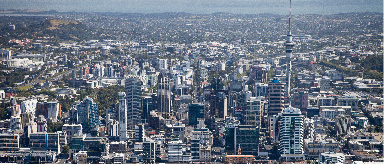 Aerial photo of central Auckland with the Sky tower in the front.