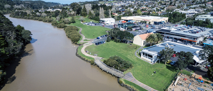 Photograph of Warkworth from the Mahurangi river overlooking the Warkworth library and shopping area