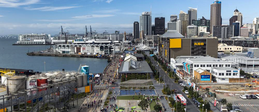 Photograph of Wynyard looking over the play park, fish market, restaurants, asb building, viaduct events centre and the Hilton hotel in the background