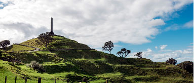 Photograph of the One Tree Hill summit and obelisk from inside Cornwall park.