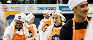 Photograph of workers at a factory unit.