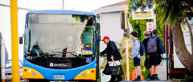 Passengers boarding a bus.